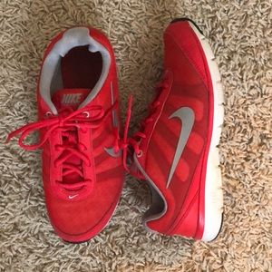 Red Nike training shoes